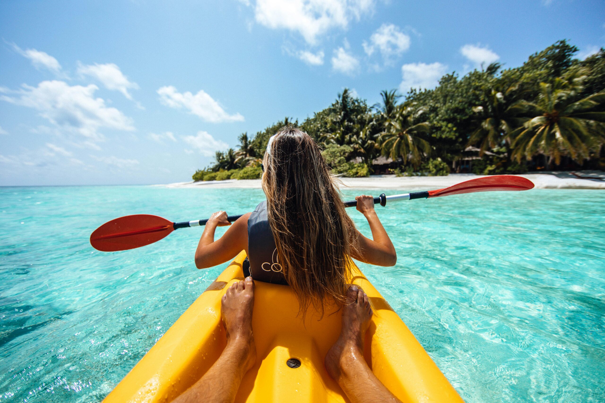 Kayaking on crystal clear water in Maldives